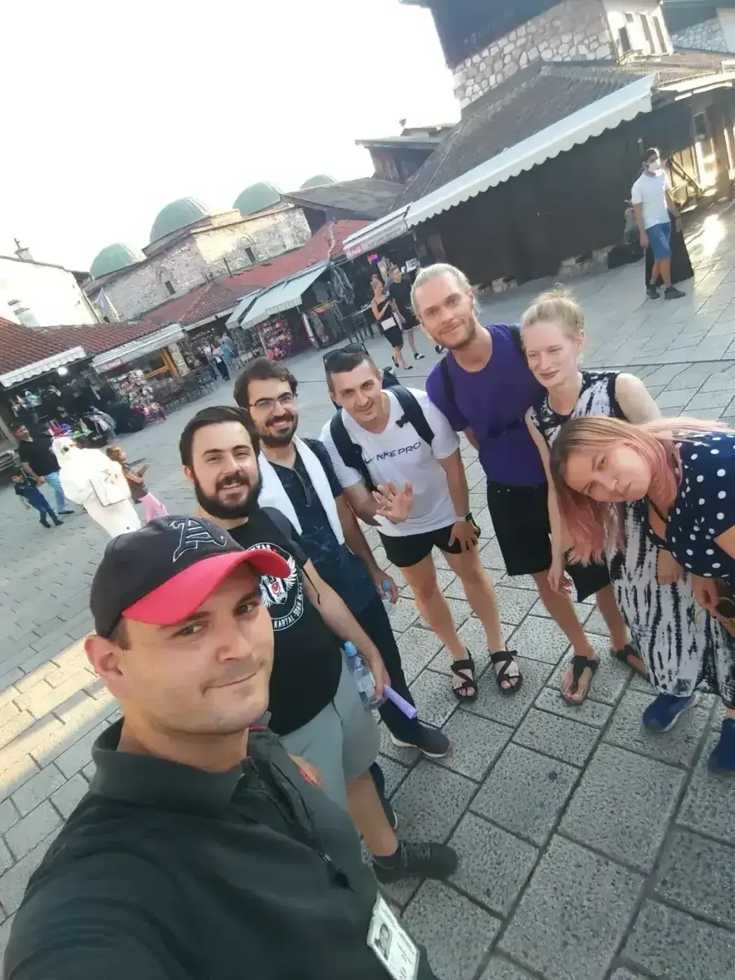 Visitors on a Sarajevo Free Walking Tour in Baščaršija market